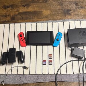 Nintendo Switch Console with Red and Blue Joy-Cons with 3 games